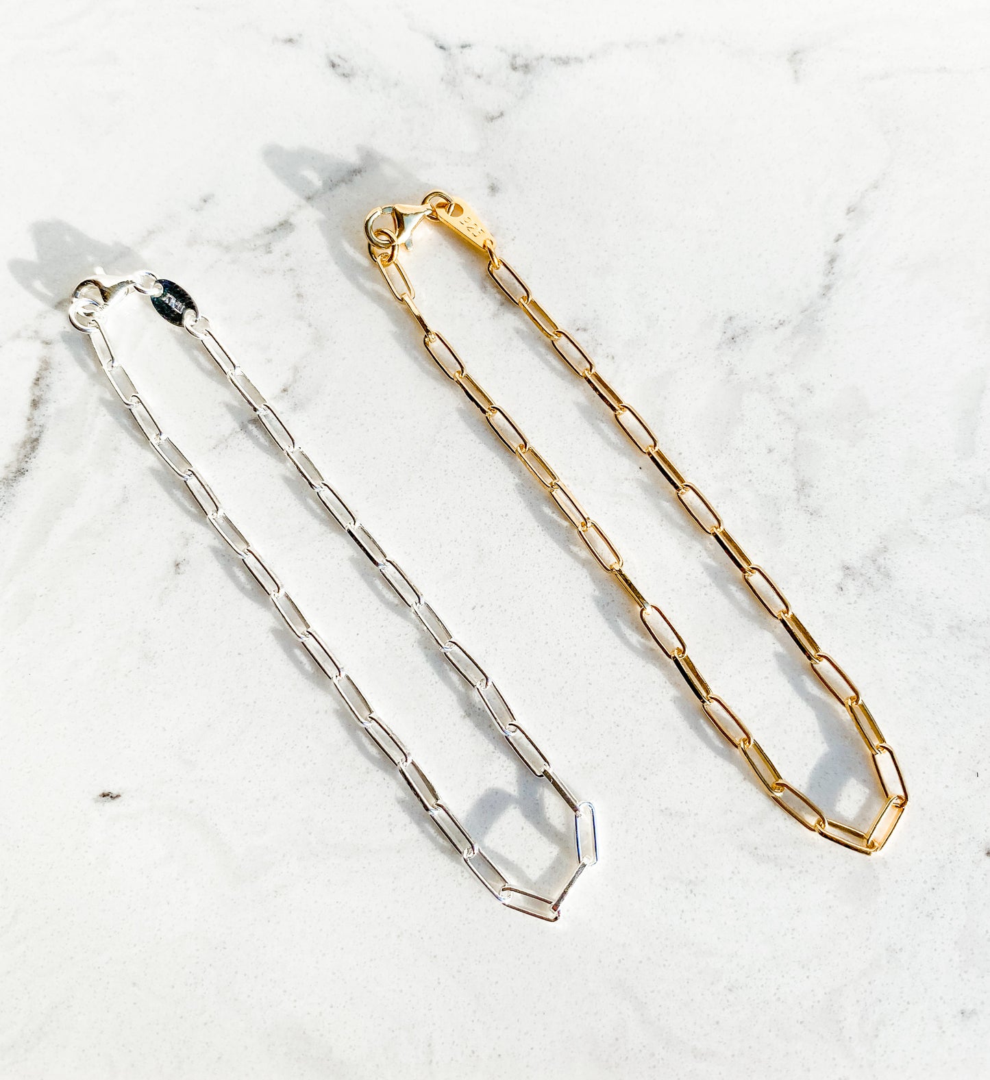 Express your unique style with this 7” paper clip bracelet. Finely crafted in 2.5x6.2mm link 22K yellow gold (over silver) or Sterling Silver, this is a must have for any jewellery collection.